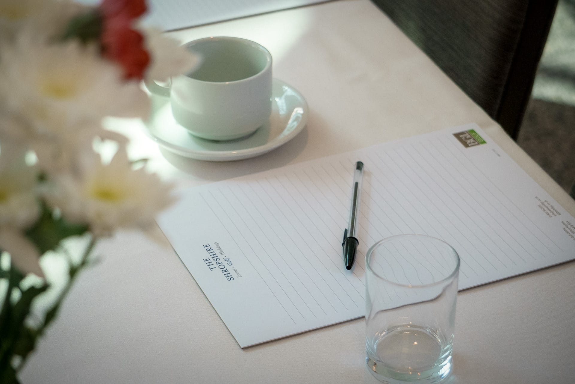Notepad and pen on table at meeting room hire venue in Shropshire, ideal for corporate events and business meetings at The Shropshire