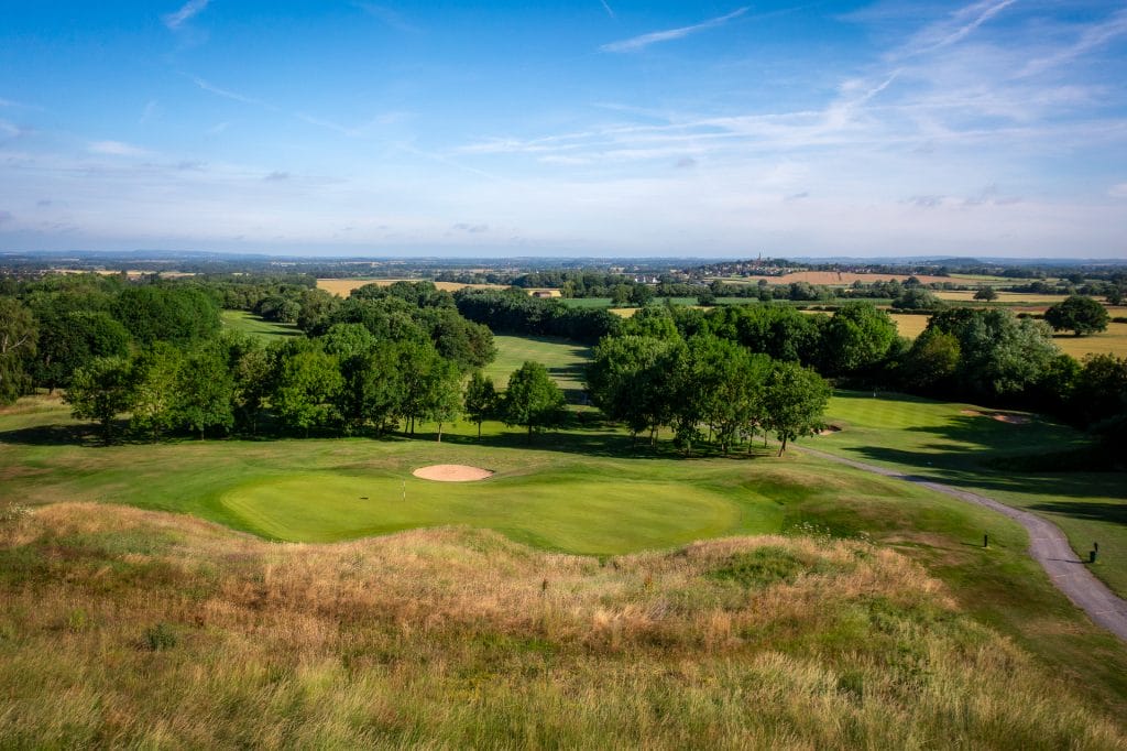 Golf green with rough area at the back on the 18 hole golf course in Telford at The Shropshire Golf Club