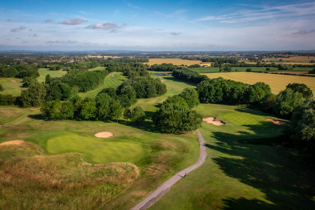 Multiple golf holes across the 18 hole golf course in Telford at The Shropshire Golf Club, featuring varied layouts and natural landscapes